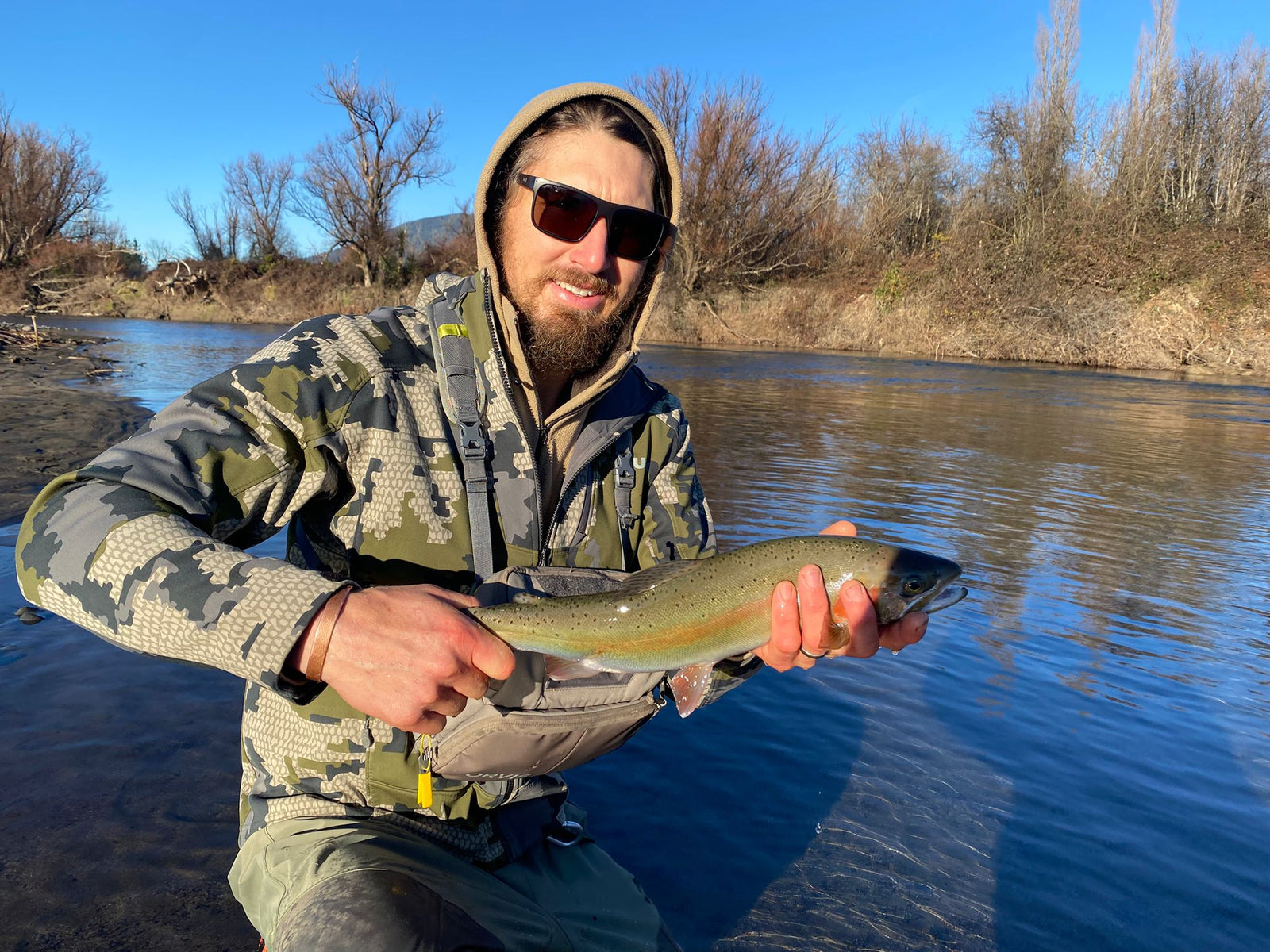 Angler with Taup trout